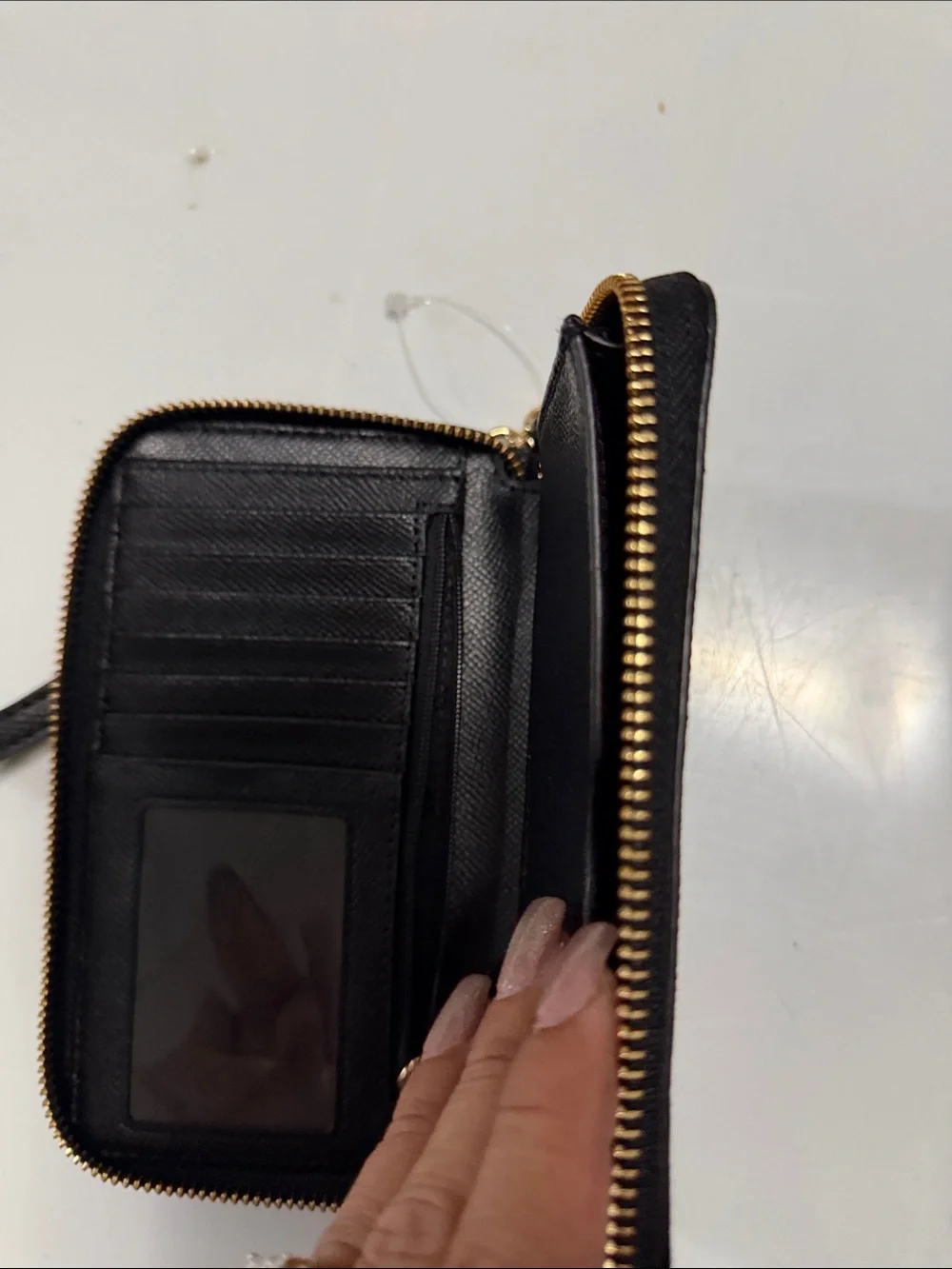 Michael Kors Black Wristlet with Gold Stud Pattern